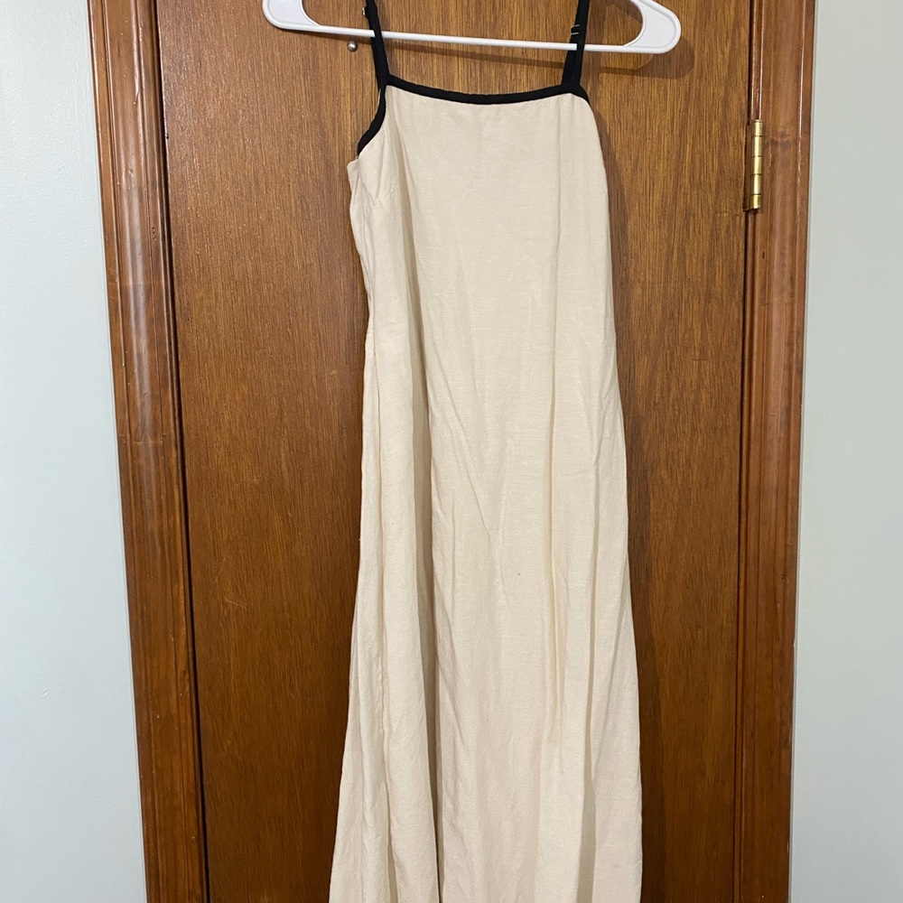 Sleeveless Cream Maxi Dress with Black Trim